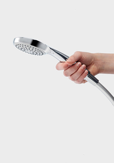 Using the chrome plated hand-held shower 