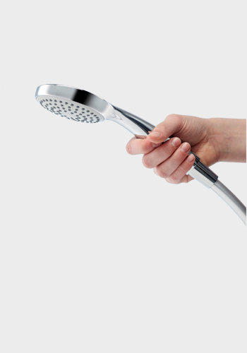 Using the chrome plated hand-held shower 